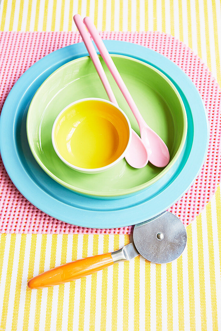 Colorful crockery and cutlery