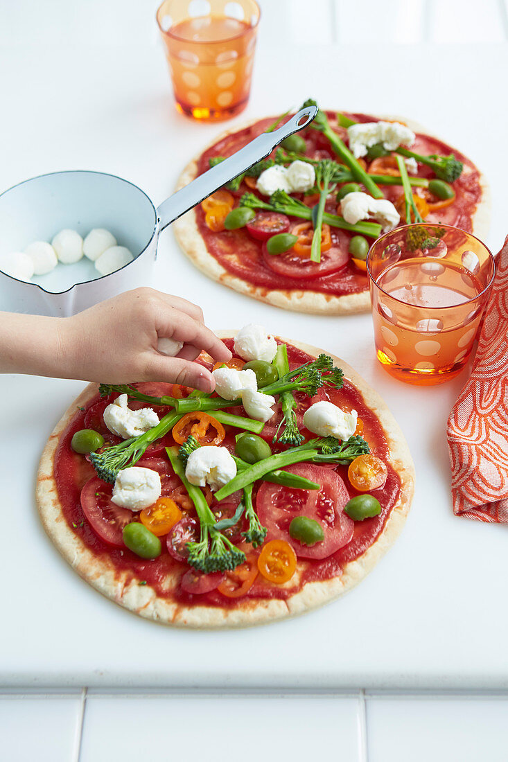 Rainbow pizza with vegetables and mozzarella topping