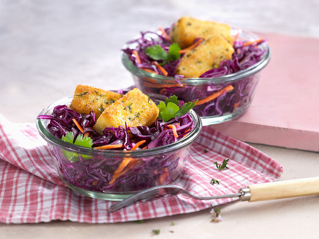 Red cabbage salad with carrots and baked sheep's cheese