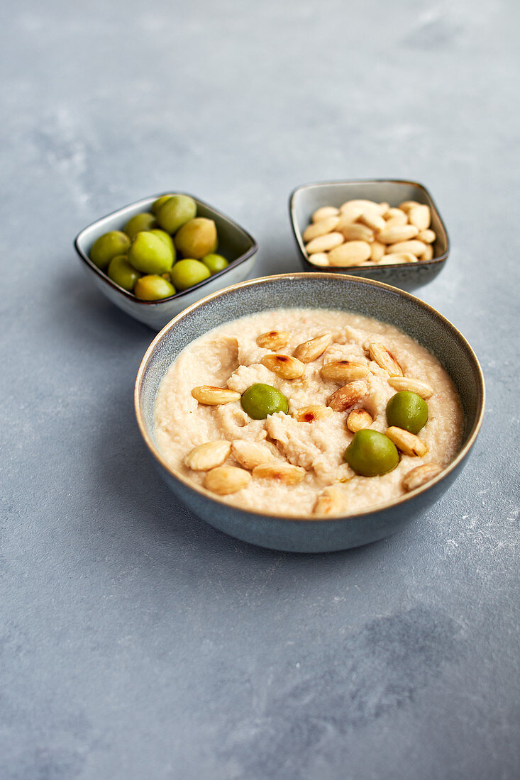Bean cream with almonds and olives