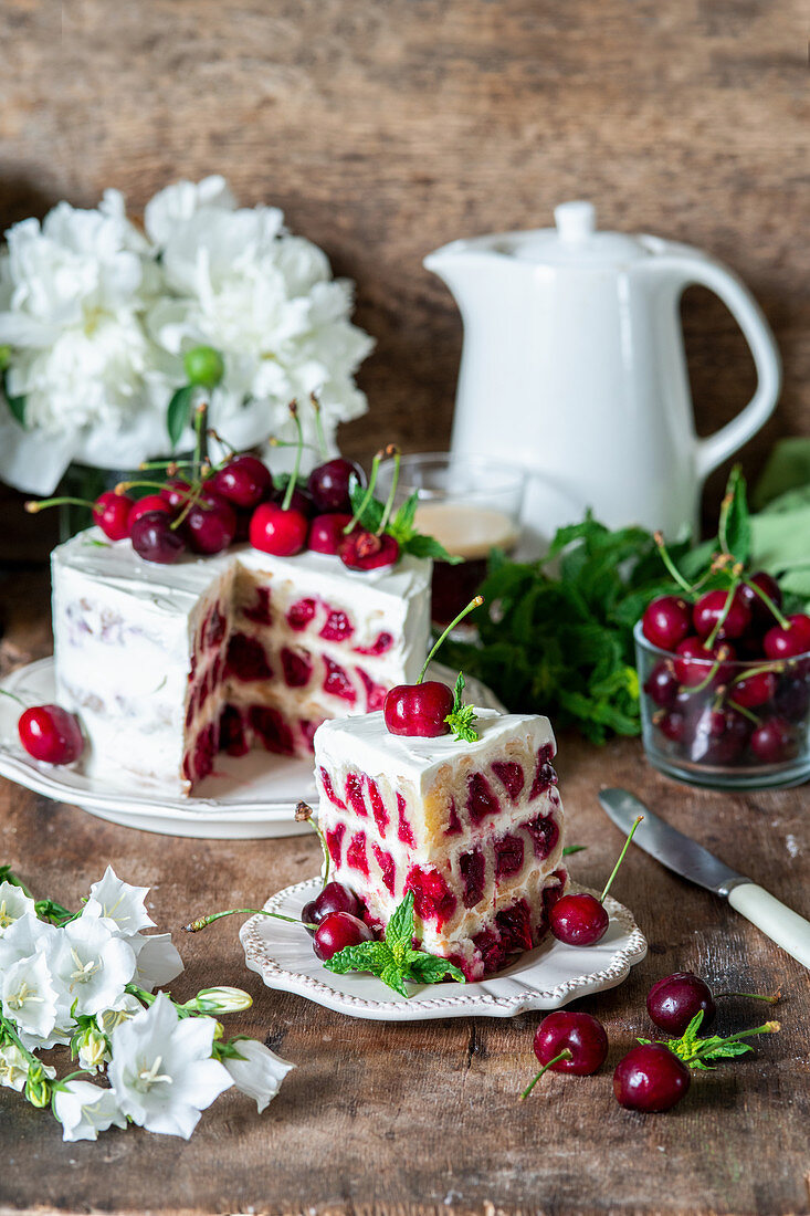 Cherry cake made with shortcrust pastry rolls (snails) and sour cream