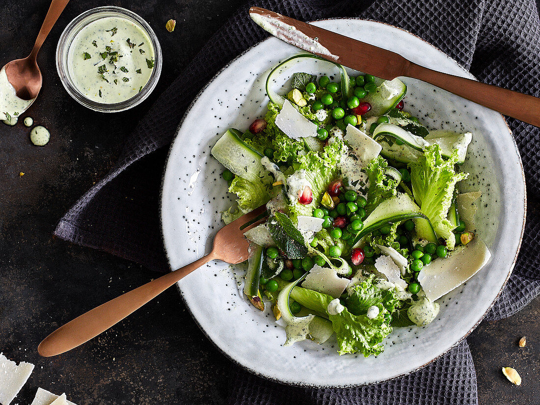 Pea salad with courgette and Parmesan cheese