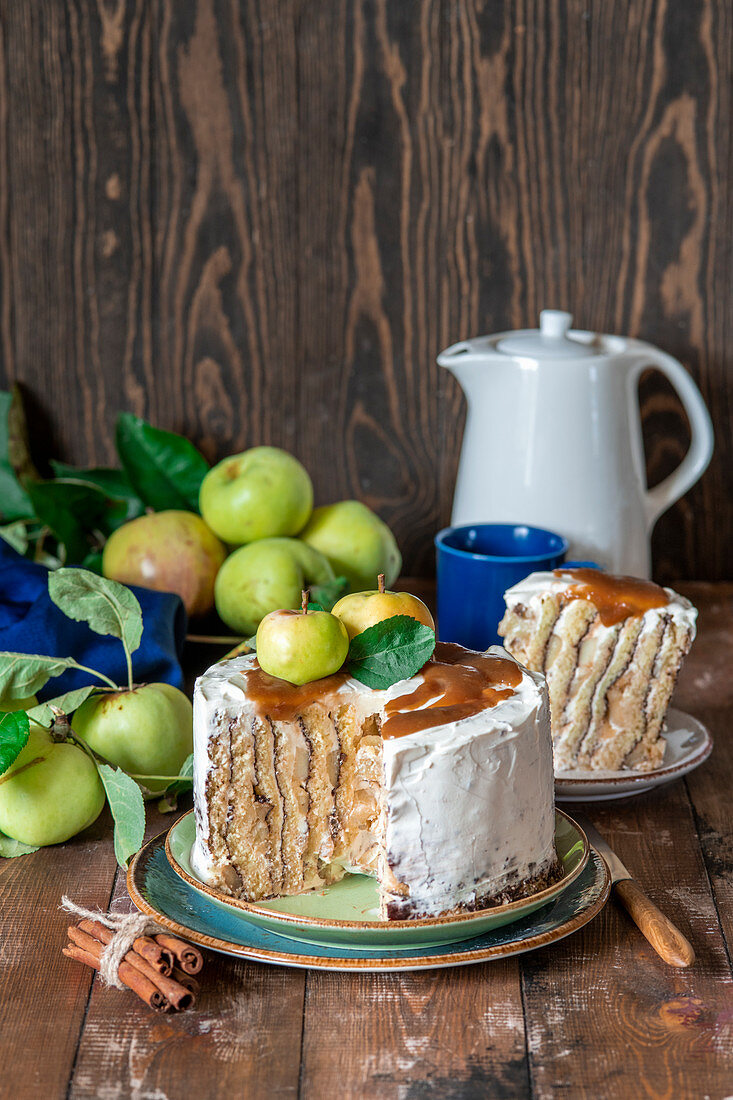 Vertical apple cake with cinnamon and cream