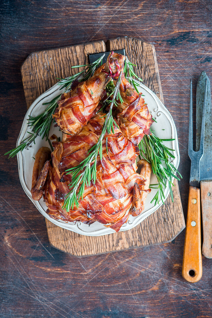 Chicken wrapped in bacon roast with rosemary