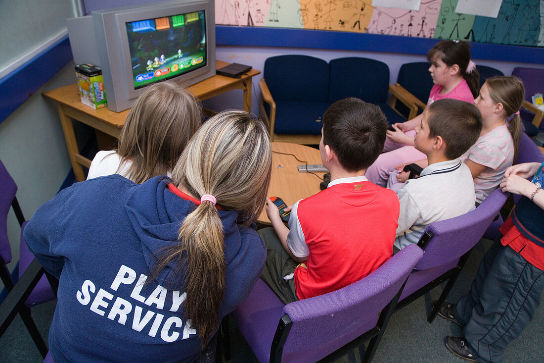 Children playing on a video game