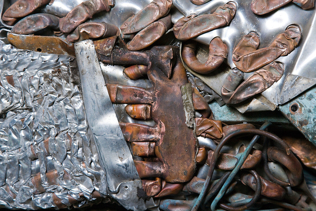 Crushed aluminium and radiators at a metal recycling centre
