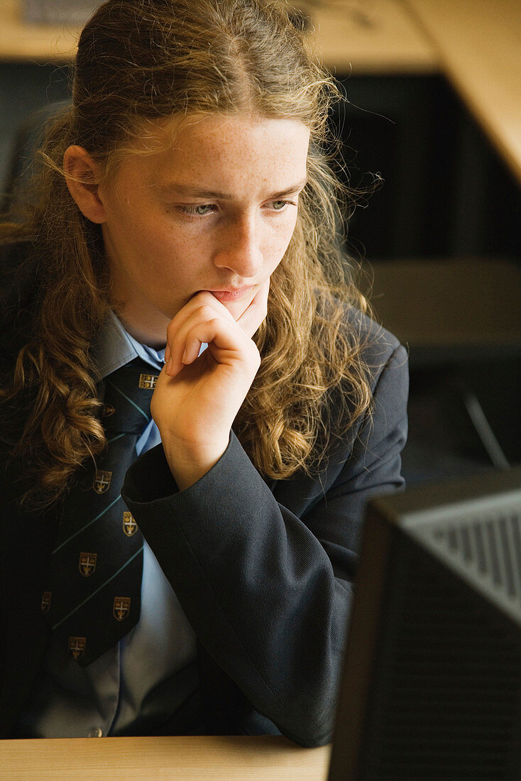 Secondary school student concentrating in an ICT lesson