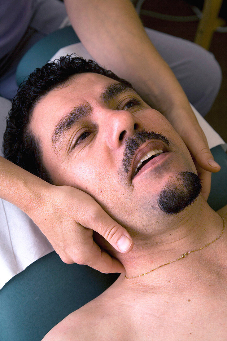 Patient being treated by a chiropractor