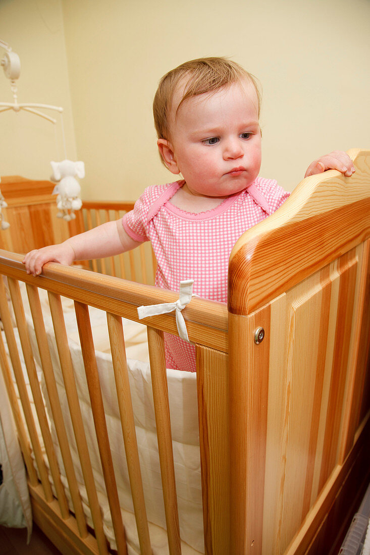 Baby in cot