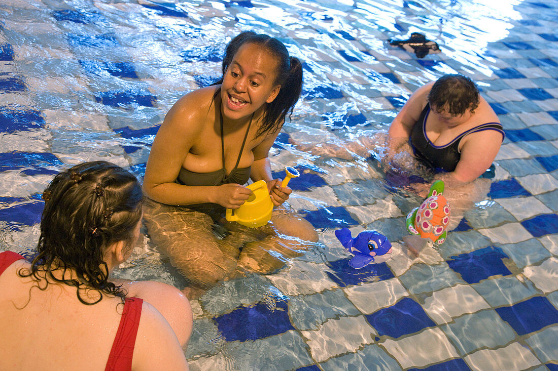Women with learning disability in swimming pool