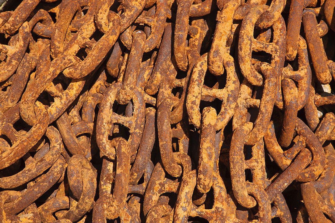 Rusty chain on quayside