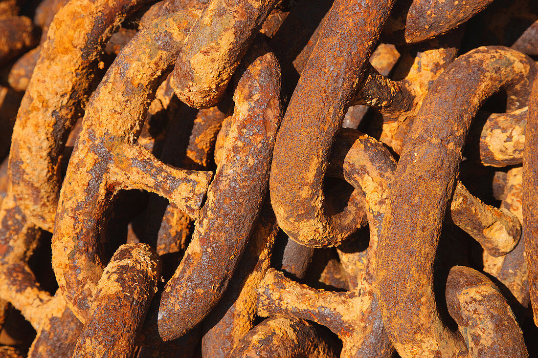 Rusty chain on quayside