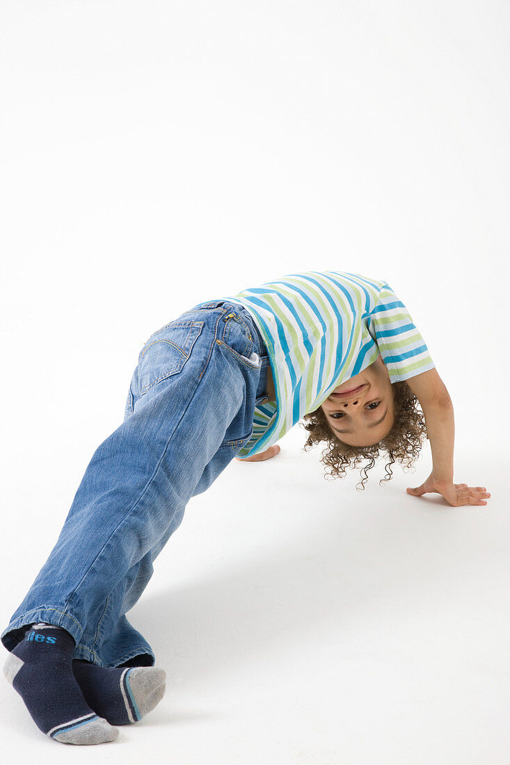 Little boy doing gymnastics