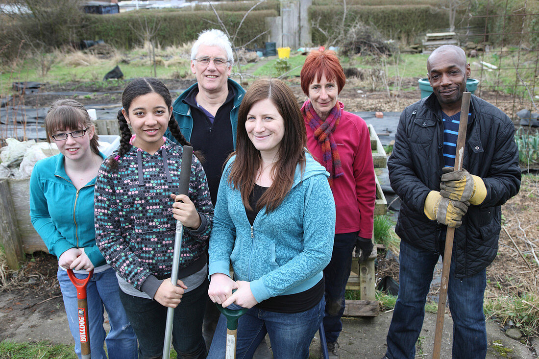 Portrait of gardening group on an allotment