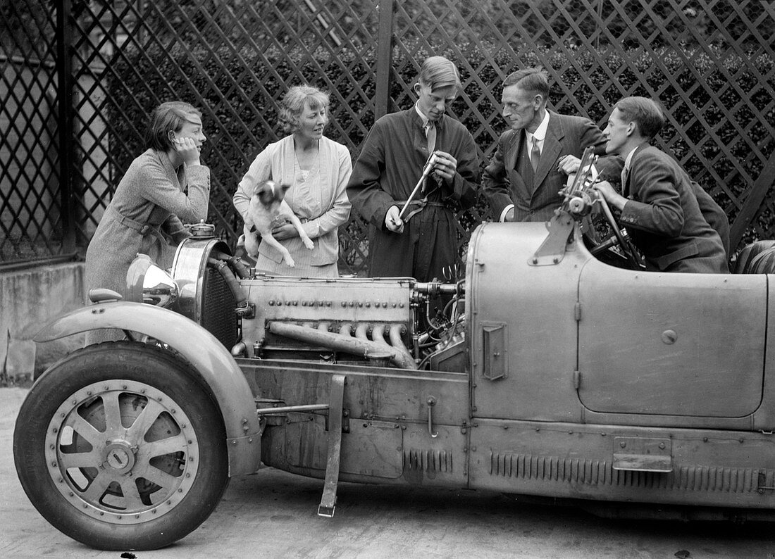 Denis Evans inspecting the plugs of his Bugatti Type 43