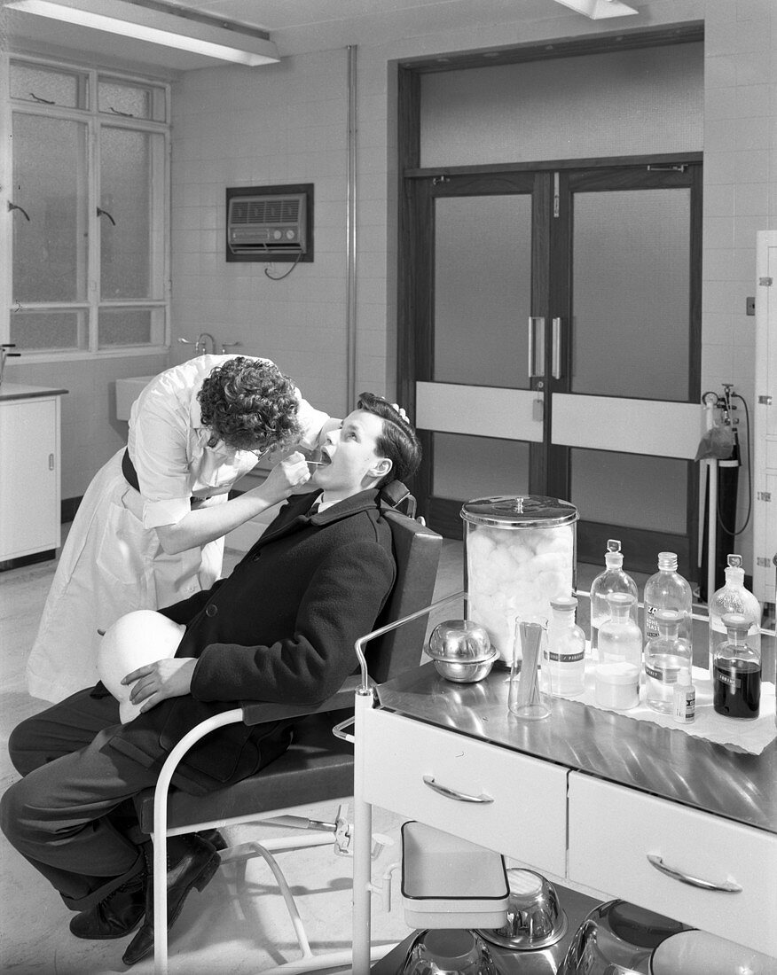 Health check in the medical room, 1964