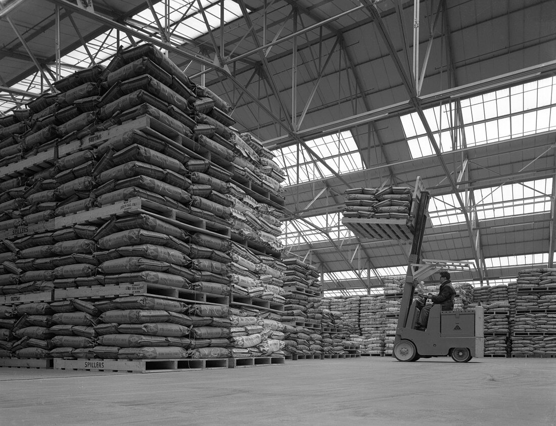 Warehouse scene with forklift truck, 1961