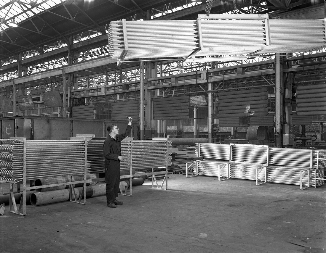 Lowering galvanised heat exchangers, 1964