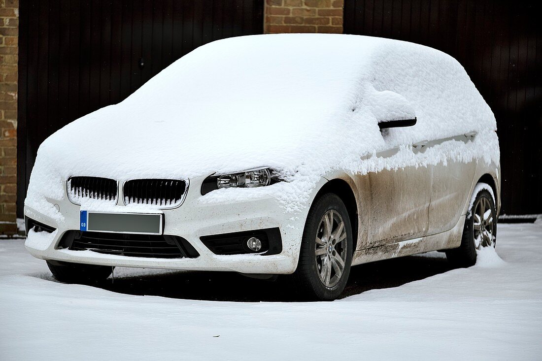 Snow-covered car