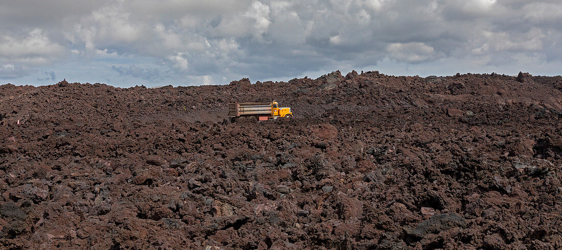 Road-building on lava flow from Kilauea volcano eruption