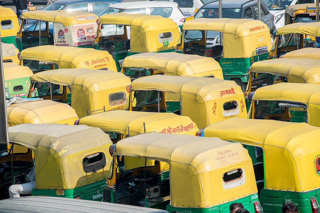Auto rickshaws lined up in downtown New Delhi, India