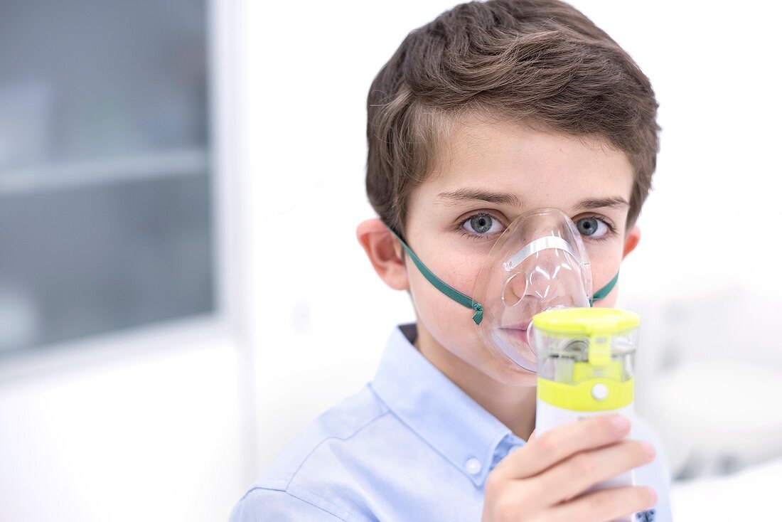 Boy using nebuliser