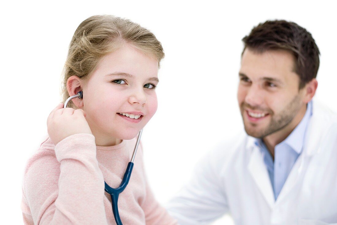 Girl role playing doctor with stethoscope