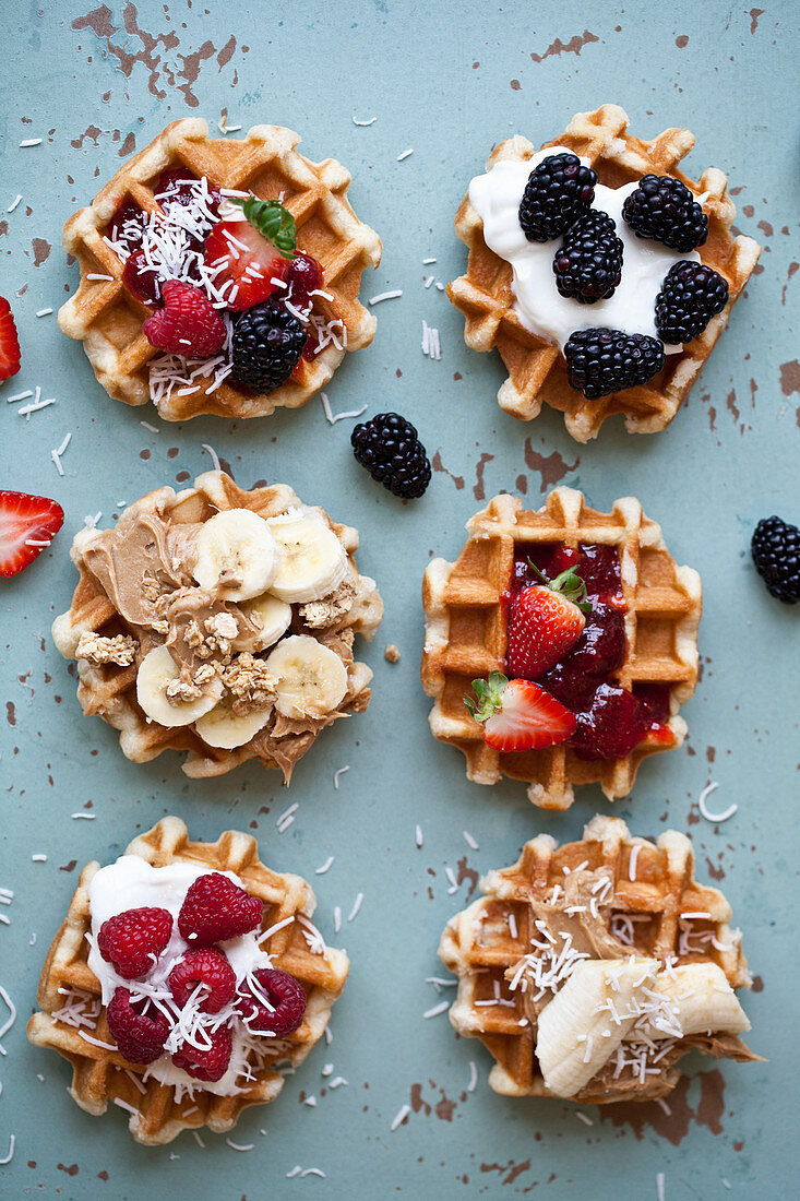 Waffles topped with various toppings