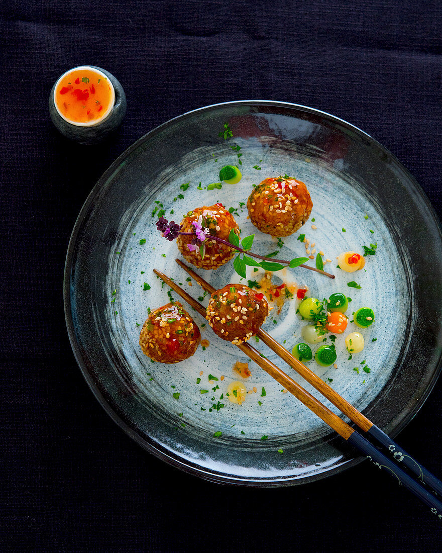 Sesame and tofu balls with sweet chili sauce