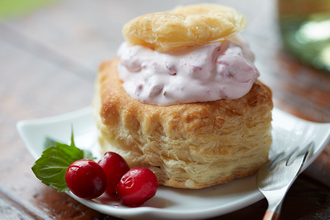 A vol-au-vent filled with cranberry and ricotta cream