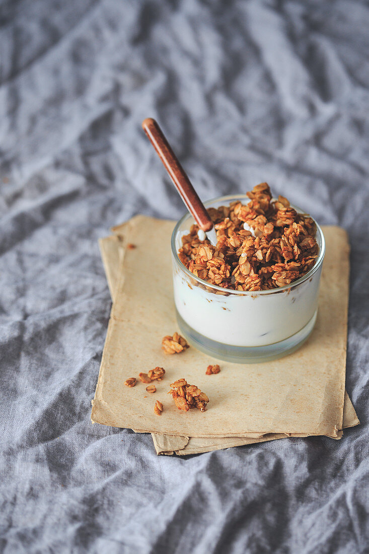 Granola with yoghurt in a glass.