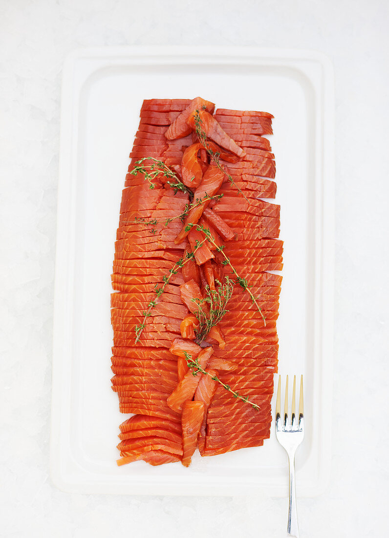 Sliced side of salmon with fresh thyme