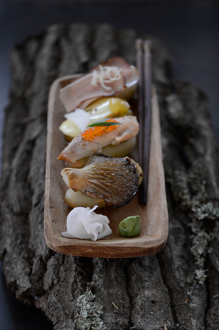 Potato nigiri with oyster mushrooms and fish
