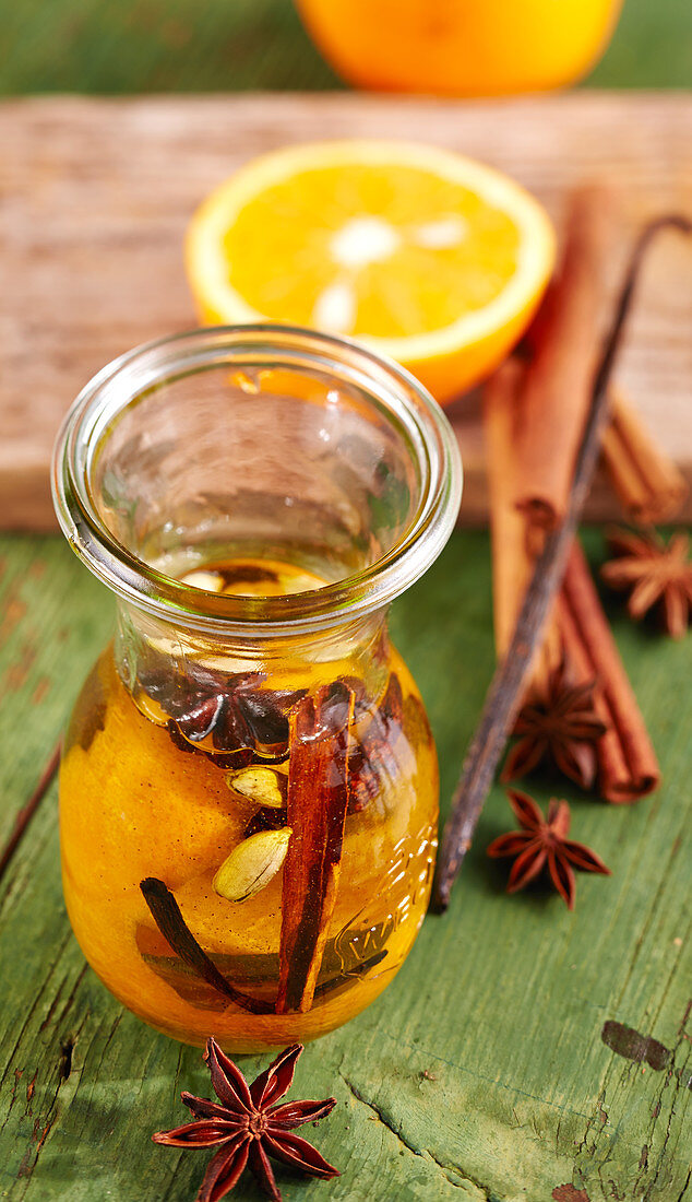 Homemade seasoning oil with oranges