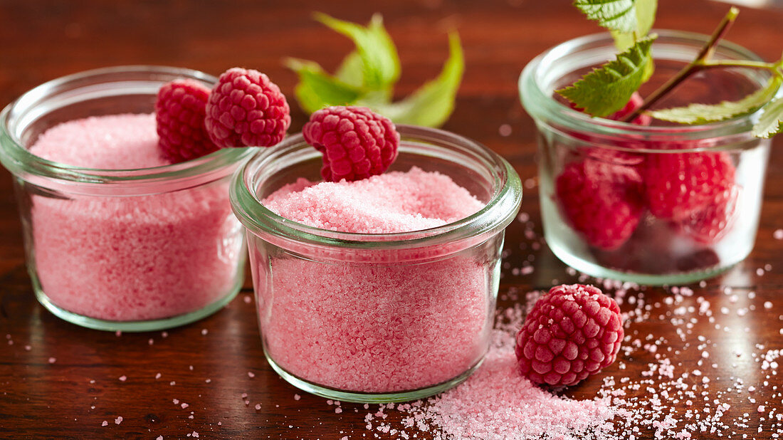 Homemade raspberry sugar in glass jars