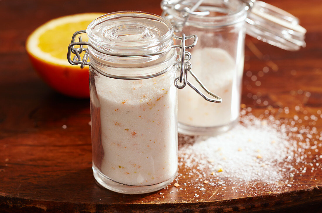 Homemade orange and lemon sugar in jars