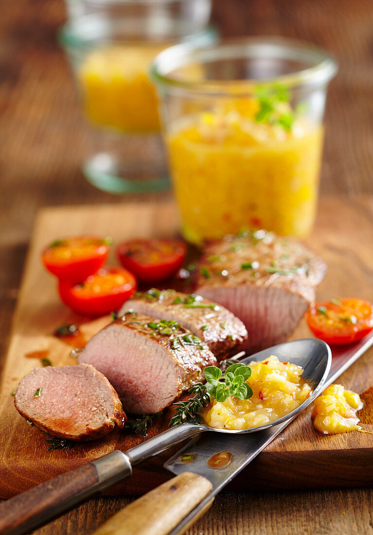 Roasted lamb fillets with homemade peach ketchup