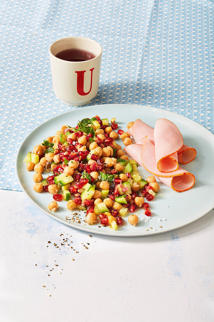 Colourful pearl salad made with chickpeas and pomegranate seeds