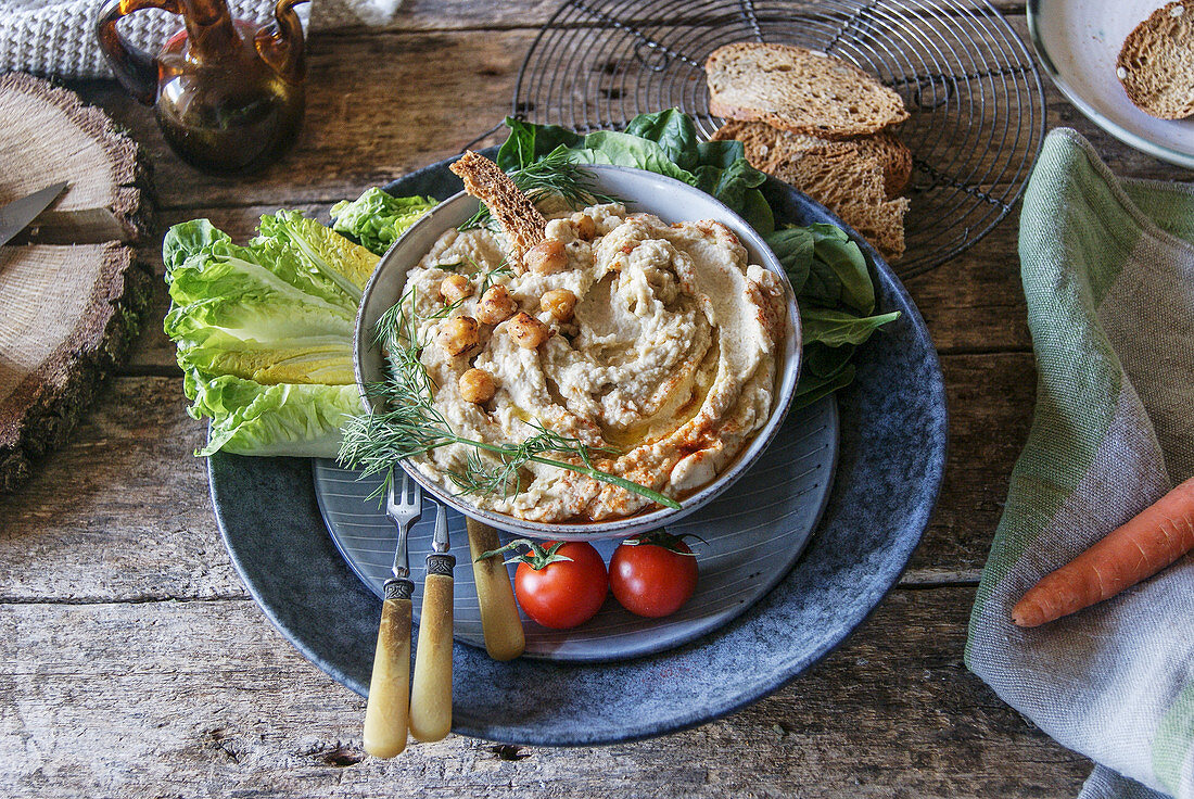 Plate with delicious artichoke hummus