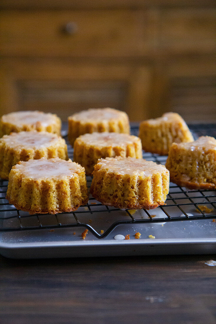 Orange and almond cakes on a cooling rack