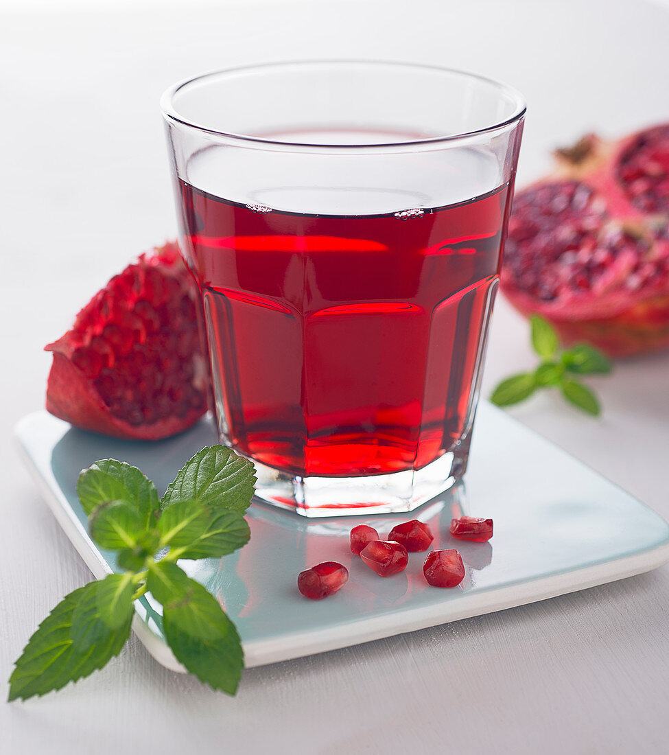 A glass of pomegranate juice
