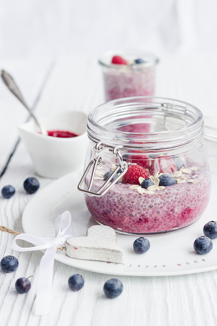 Raspberry chia pudding in glass jars