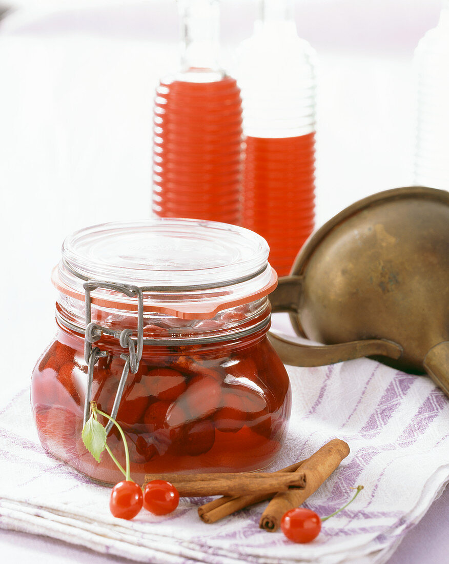 homemade liqueur made with preserved sour cherries and cinnamon sticks