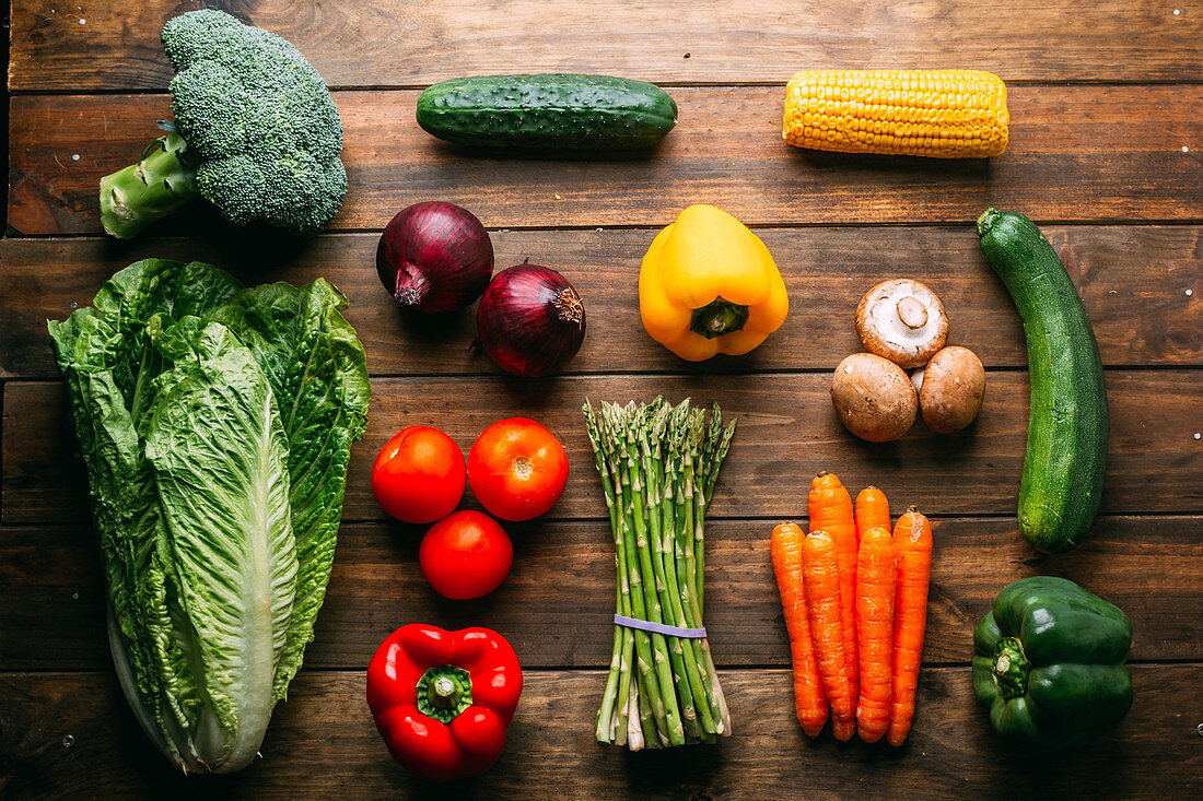 Vegetables and utensils on kitchen table