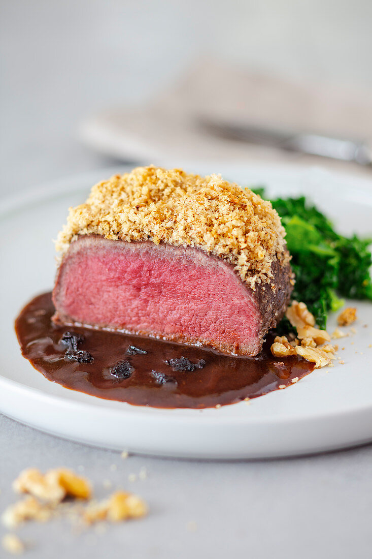 Pink fried venison with a nut crust