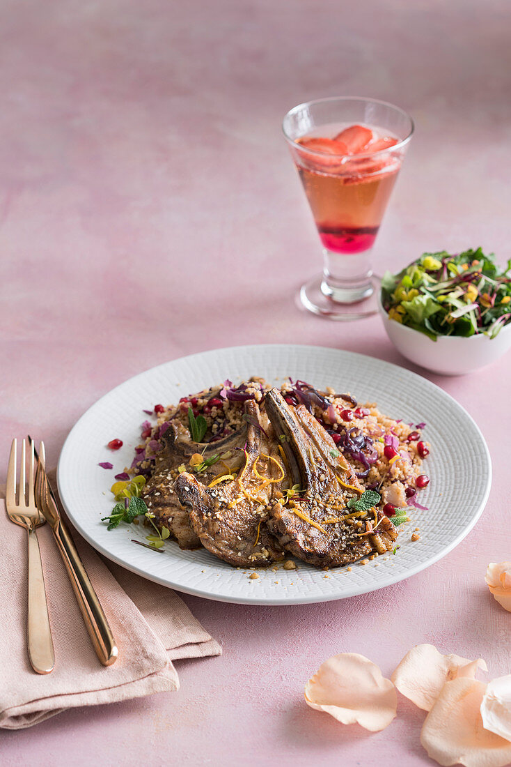 Lamb cutlets with pomegranate, rose couscous and rosé sangria