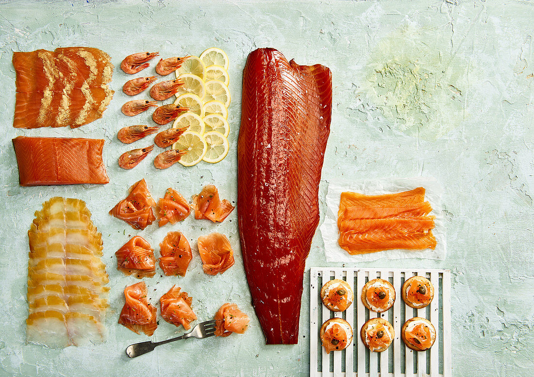 Smoked fish variety - smoked salmon, prawns and haddock and blini