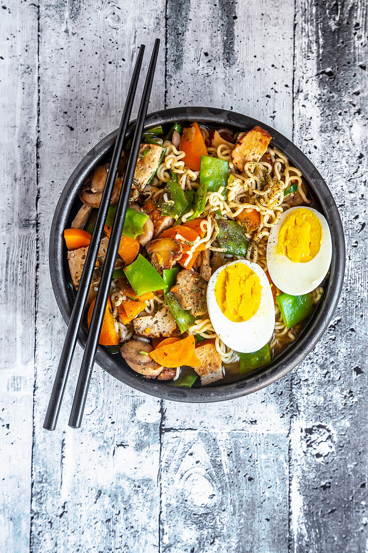 Ramen soup with vegetables, mushrooms, smoked tofu and egg