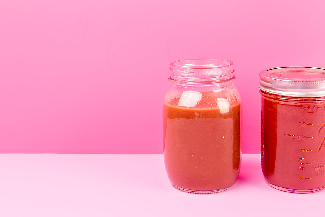 Hot vegetable soup in jars