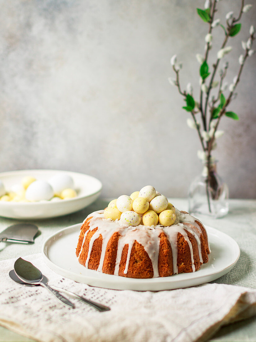 Coconut Easter cake with white chocolate eggs